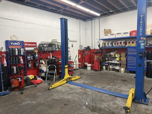 Shop interior with hydraulic lift